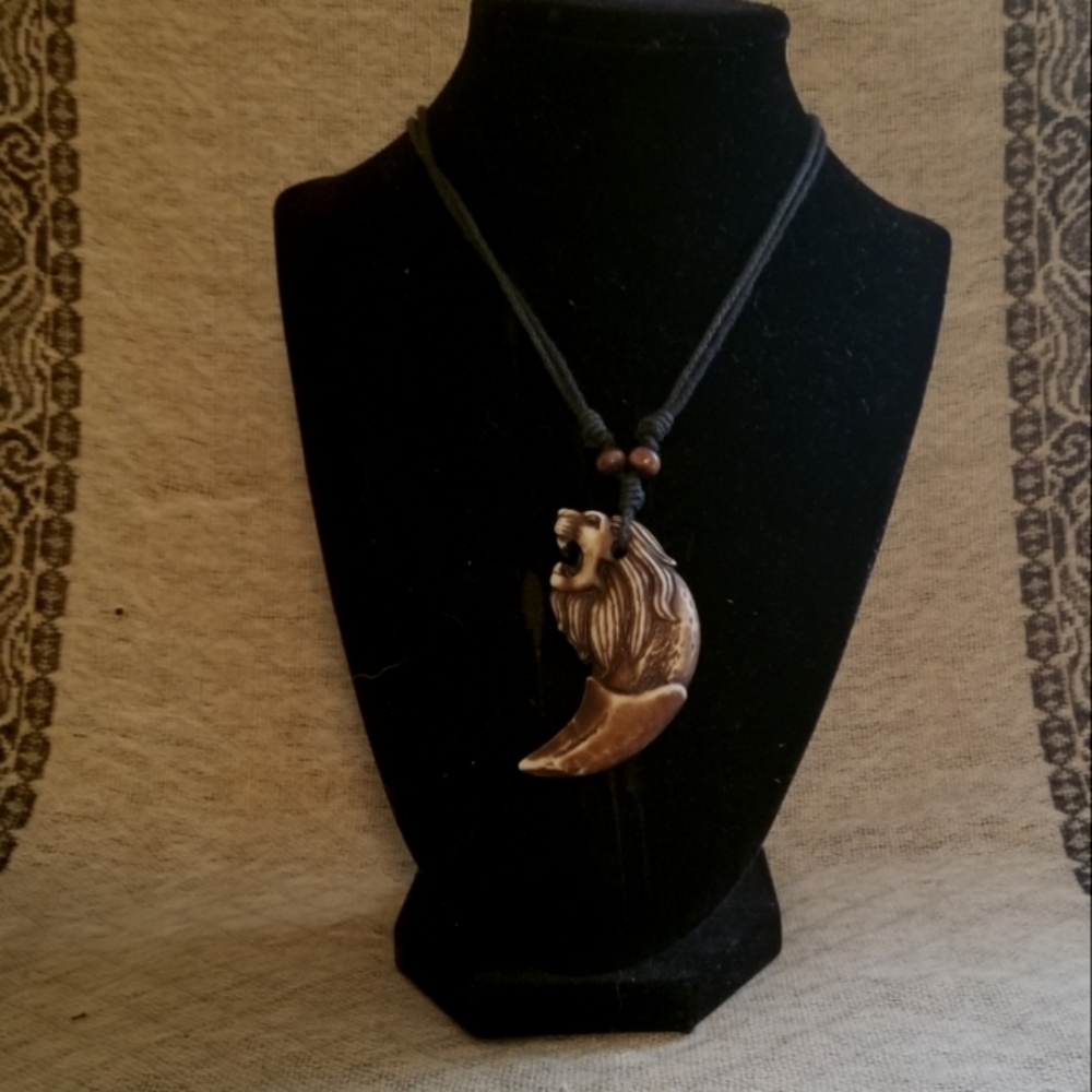 Carved lion necklace